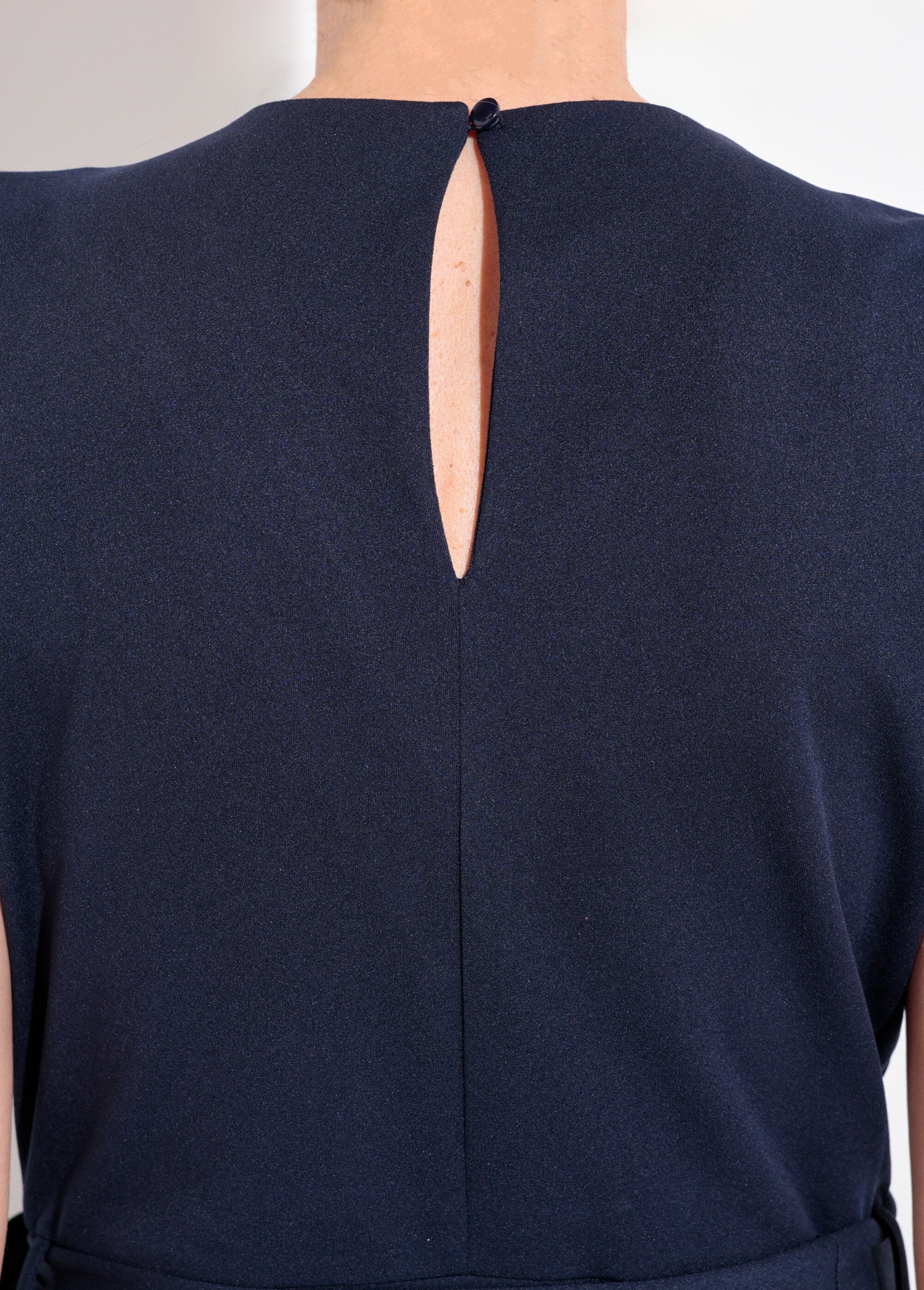 V-neck_belted_jumpsuit_with_gold_details_Marine_DE2_slim